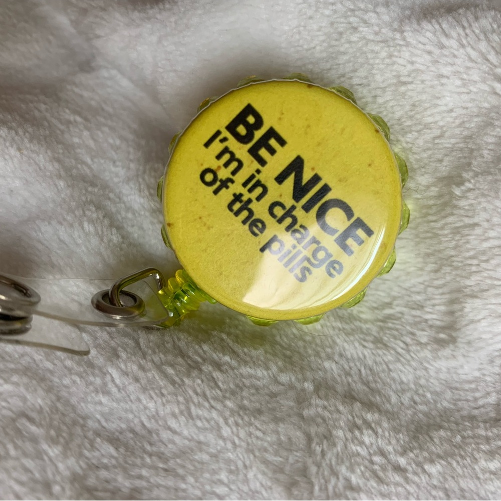 Badge reel with belt clip “Be nice I’m in charge of the pills” pharmacy / nurse